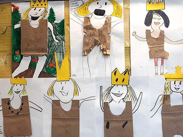 Seven paper bag portraits by kids