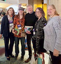 Jen and Larson with other booksellers